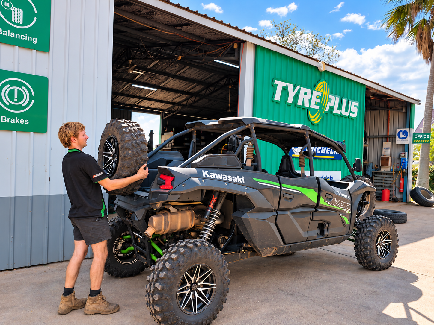 Fitting a tyre on a Kawasaki UTV outside the Tyreplus Kununurra workshop
