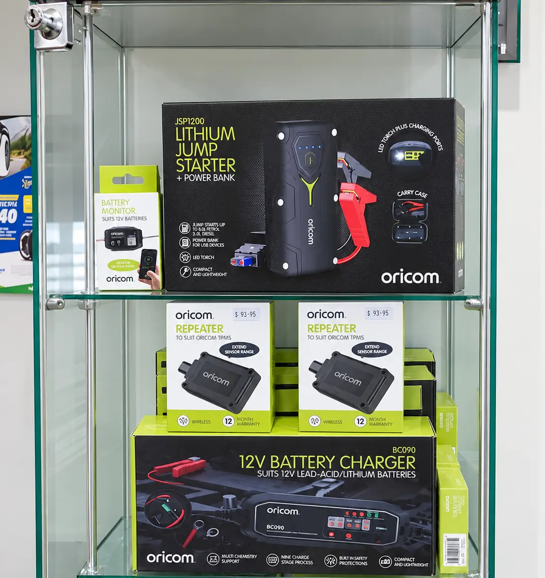 Tyreplus Kununurra display cabinet stocked with Oricom jump starters, battery monitors, TPMS repeaters and chargers